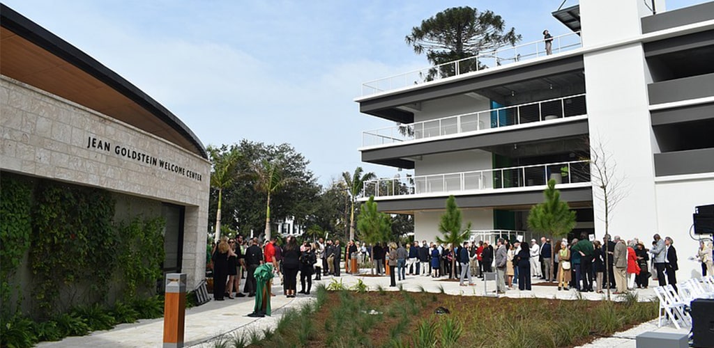 people standing near Jean Goldstein Welcome Center