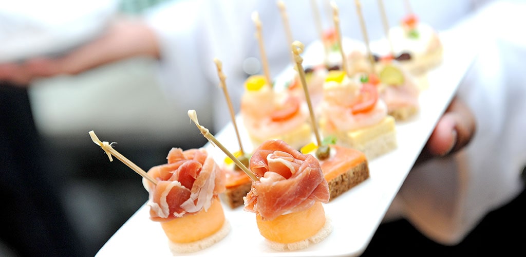 Fancy culinary dish on the white plate at Ritz-Carlton in Sarasota