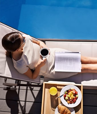 Poolside dining at The Ritz Carlton Residences Sarasota Bay