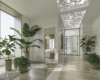 Serene spa-style treatment room with natural lighting, indoor plants, and calming modern finishes.