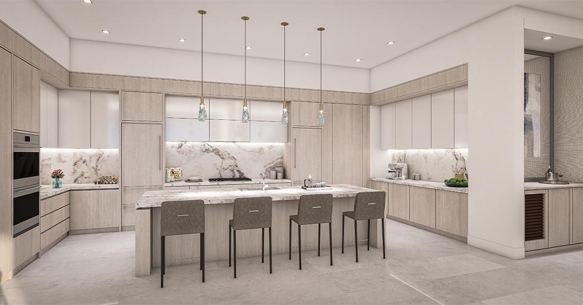 Open living and dining room with ocean views through floor-to-ceiling windows.