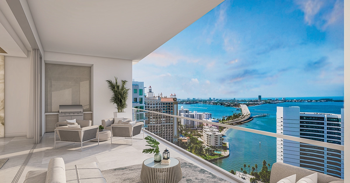 Covered terrace with outdoor seating, glass railing, and wide blue bay views.